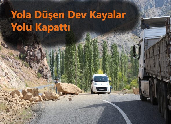 Yola düsen dev kayalar yolu kapatti